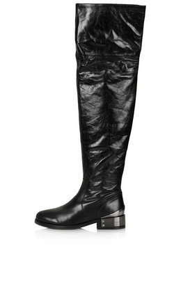 Topshop Black premium leather high leg boots with metal trim. heel height approx 2cm. 100% leather. do not wash.