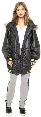 DKNY x Cara Delevingne Oversized Puffer with Faux Fur Hood