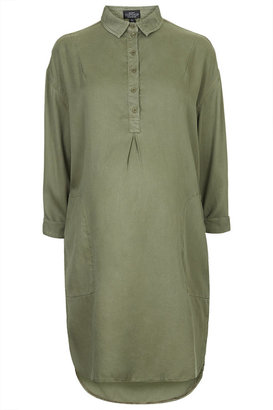 Tencel 16764 Maternity shirt dress with button placket and box pleat detail designed to sit neatly over the bump with room to grow throughout all stages of pregnancy. 100% lyocell. machine washable.