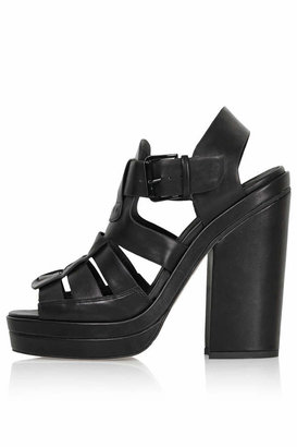 Topshop Black strappy chunky platforms. heel height 5'5" approx. 100% polyurethane.