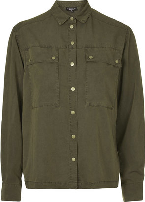 Tencel 16764 Long sleeve casual shirt with front pocket detail in khaki. 100% polyester. machine washable.