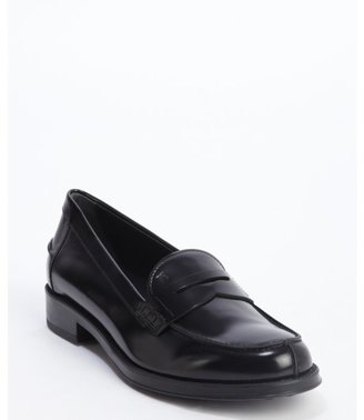 Tod's black leather penny strap loafers