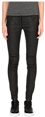 DKNY X Cara Moto coated skinny mid-rise jeans