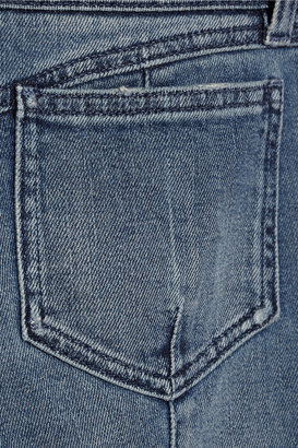 Balmain Moto-style distressed low-rise skinny jeans