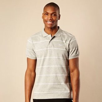 Nike grey striped polo shirt